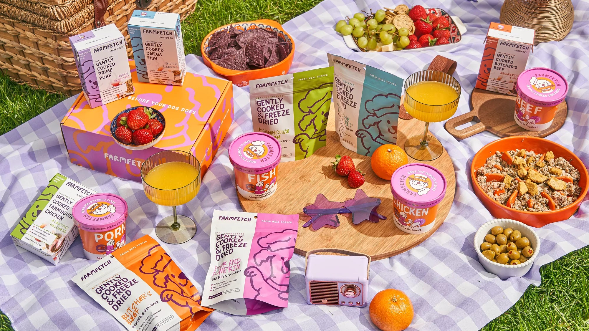 FarmFetch meals and toppers arranged on a picnic table